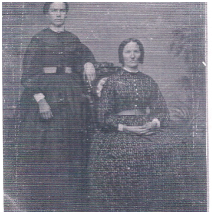 Mary Jane Udell and Mrs. John Udell seated, according to Lunau family records. Given ages likely Margaret Westunberger. Mary Jane Udell and Mrs. John Udell seated, according to Lunau family records. Given ages likely Margaret Westunberger.